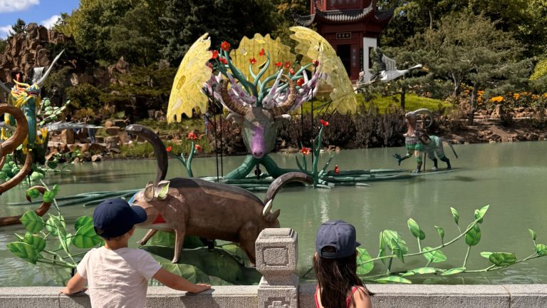 Two children exploring the Montreal Botanical Garden, a family-friendly destination for autism families.