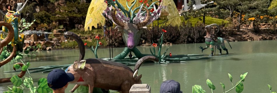 Two children exploring the Montreal Botanical Garden, a family-friendly destination for autism families.